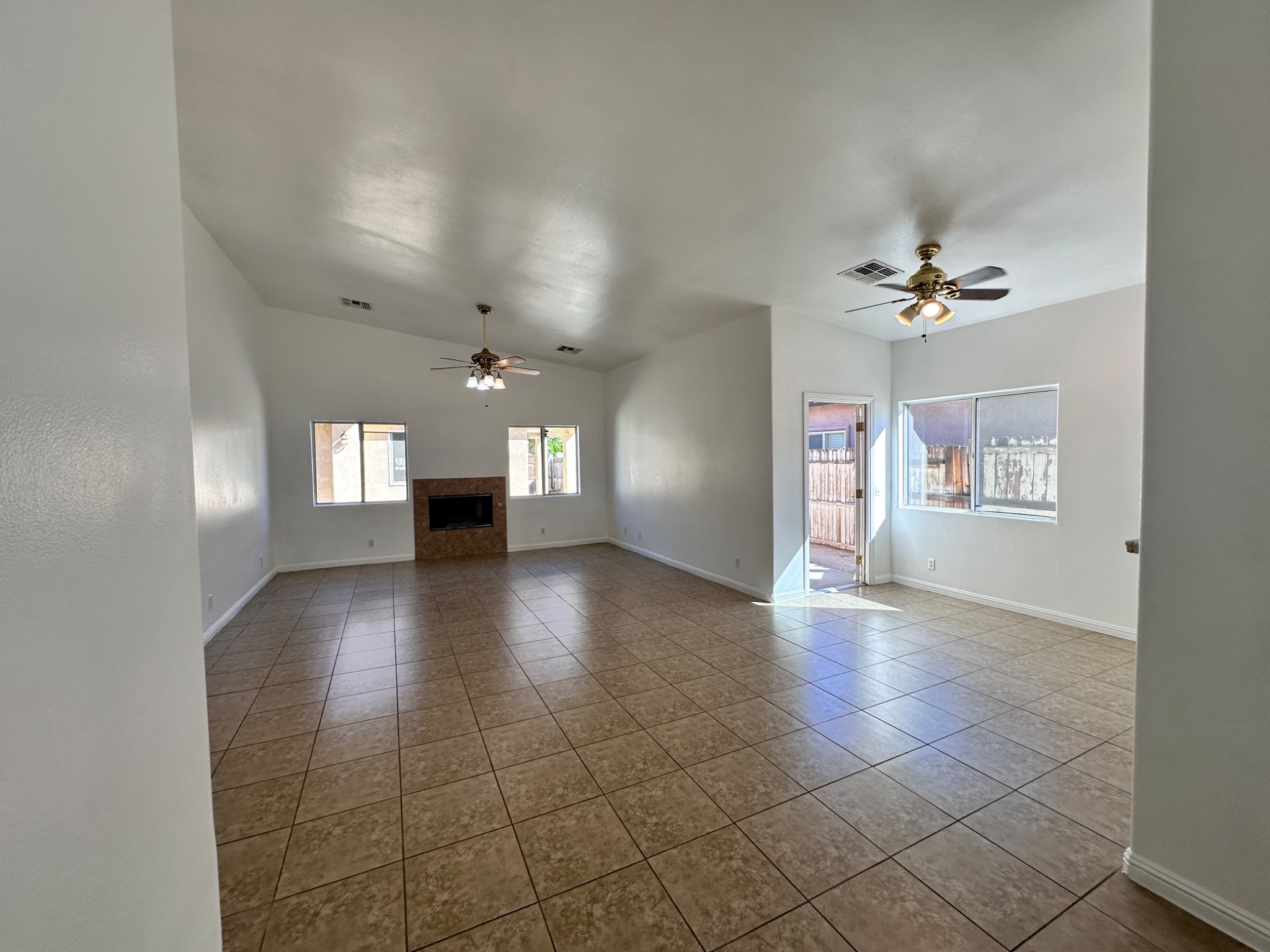 Living and dining area at 16320 Avenida Monteflora